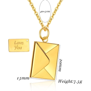 Macro detail of gold envelope necklace with Love You engraving and size specs
