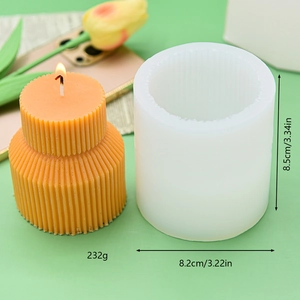 Ribbed cylindrical silicone candle mold with orange wax sample and size dimensions