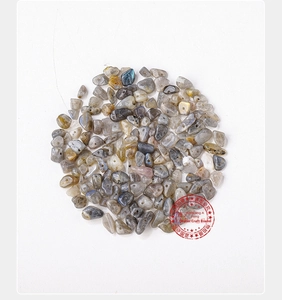 Macro shot of irregular labradorite stone beads with blue flash and pre-drilled holes