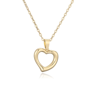 Minimalist gold hollow heart pendant necklace with fine chain on white background