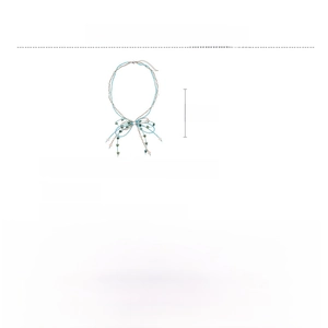 Detail of beaded bow necklace with blue crystal and white marble beads on titanium steel
