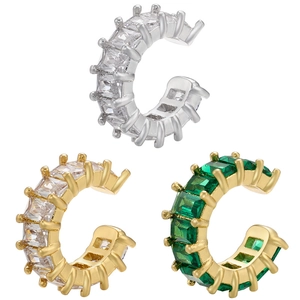 Detailed view of silver and gold C-shaped ear cuffs with micro-pave cubic zirconia