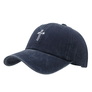 Vintage washed navy baseball cap with white cross embroidery in a 45-degree side view