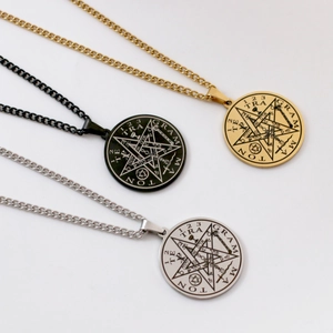 Star of Solomon talisman necklaces in gold, black, and silver finishes on white background