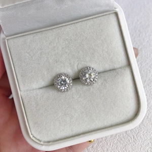 Close-up of S925 sterling silver halo stud earrings with 5A cubic zirconia in gift box