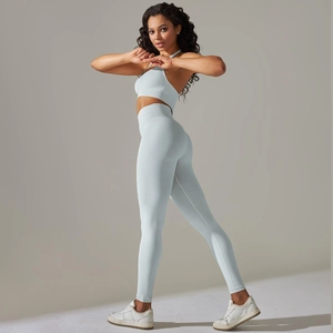 Detail of light blue seamless yoga set showing ribbed texture on sports bra and leggings
