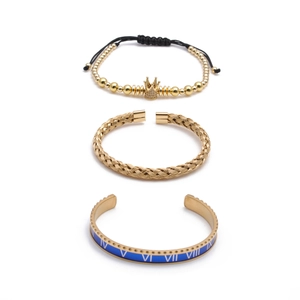 Three-piece gold plated stainless steel bracelet set with crown charm and Roman numerals