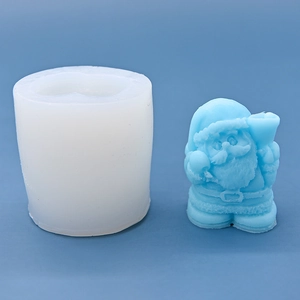 Cylindrical silicone mold for creating Santa Claus candles with detailed 3D carving