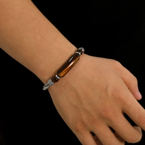 Vintage stainless steel men's bracelet with rectangular tiger eye stone on wrist