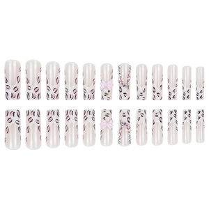 Pink and black leopard print long coffin nails with bow and rhinestone accents