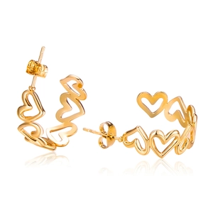 Minimalist gold hollow heart C-shaped earrings with woven design on white background