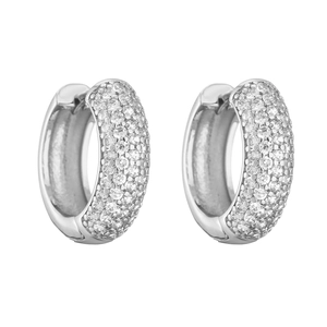 Macro view of silver hoop earrings featuring multi-row pavé set cubic zirconia