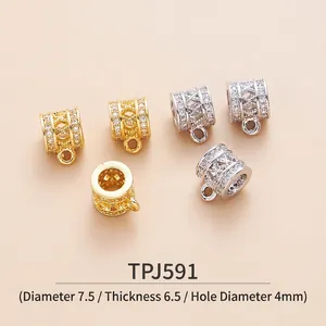 Macro view of brass spacer beads with micro-paved cubic zirconia and 4mm holes for DIY jewelry