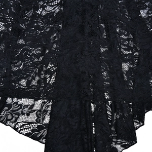 Gros plan sur tissu en dentelle noire avec motifs floraux et détails ajourés diaphanes