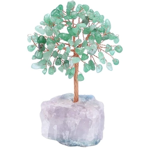 Macro detail of green crystal money tree with hand-twisted copper wire on amethyst base