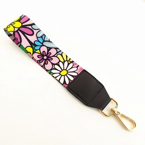 Colorful floral wrist strap with sunflower pattern and golden lobster clasp