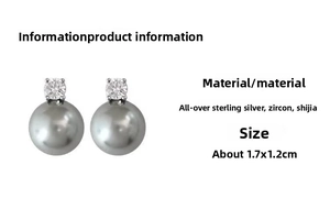 Detailed view of grey pearl earrings with sparkling zircon inlay and 925 silver finish