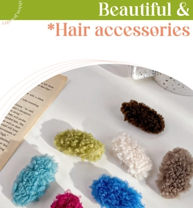 Detailed view of colorful lamb wool hair clips in various autumn and winter colors