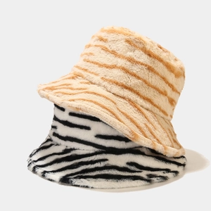 Winter faux fur bucket hat featuring warm tiger stripes and classic zebra animal patterns