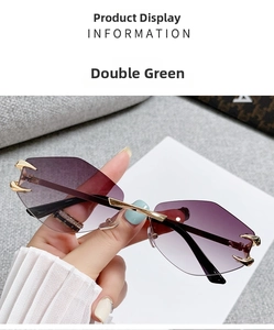 Close-up of rimless polygon sunglasses with purple gradient lenses and gold claw details
