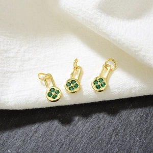 Gold rectangular flower pendants with green cubic zirconia and copper metal micro-inlays