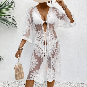 Detailed embroidery on white lace boho beach kimono cover-up with floral daisy patterns