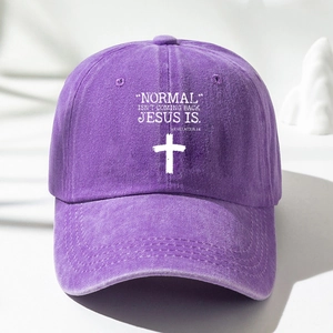 Detail of purple washed baseball cap with white cross and religious quote print