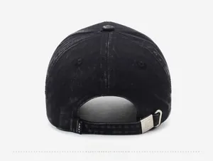 Adjustable back strap with metal buckle on a distressed vintage wash baseball cap