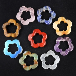 Various 30mm natural crystal flower pendants in rose quartz, amethyst and tiger eye stones