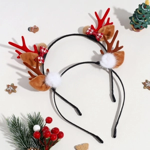 Festive Christmas reindeer antler headbands with plush balls and plaid bows on white background