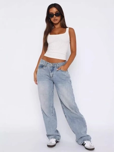Women's minimalist light blue loose straight-leg denim jeans and white ribbed tank top set