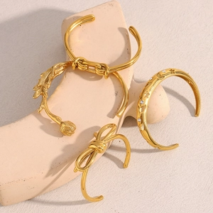 18K gold plated stainless steel open bracelets with floral, bow, and moon star designs