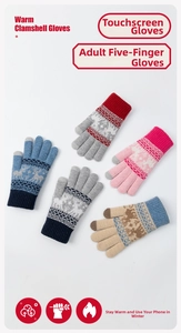 Flat lay of colorful knitted gloves with reindeer patterns and touchscreen fingertips