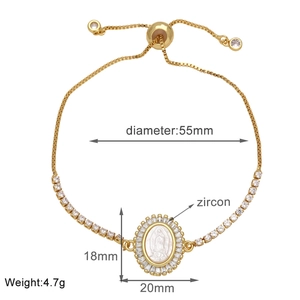 Detail of gold plated Virgin Mary bracelet showing 55mm diameter and zircon settings