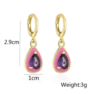 Detail view showing dimensions of gold teardrop earrings with purple stone and pink enamel