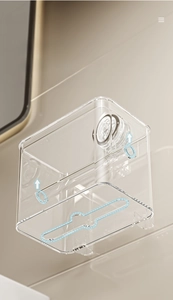 Detail of wall-mounted tissue box showing bottom drainage slots and side ventilation holes