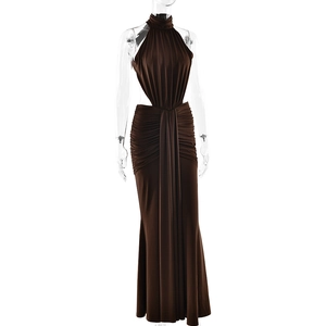 Detail view of the elegant open-back and waist cut-out on this dark brown evening dress