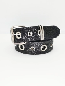 Close-up of black glitter belt with silver double-row eyelets and western buckle