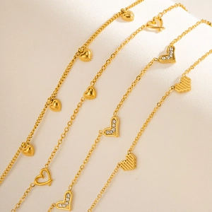 Double-layered gold titanium steel necklace featuring multiple heart pendants and beads