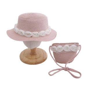 Pink straw hat and matching crossbody bag set with chiffon rose decorations for kids