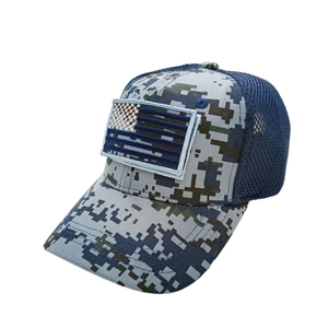 Detailed side view of blue camo baseball cap with mesh back and US flag patch