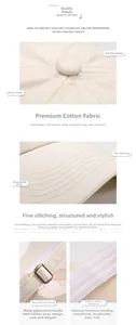 Detail of cream cotton baseball cap showing fine stitching and adjustable metal buckle