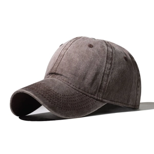 Detail of washed cotton baseball cap showing vintage texture and six-panel structure