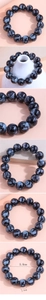 Macro shot of snowflake obsidian bracelet beads showing natural white patterns on black stone