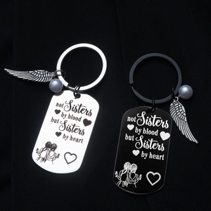 Stainless steel sisters keychain set with wing charms and heart engraved pendants