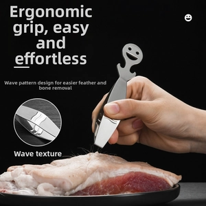 Close-up of stainless steel tweezers with wave texture for deboning and plucking meat
