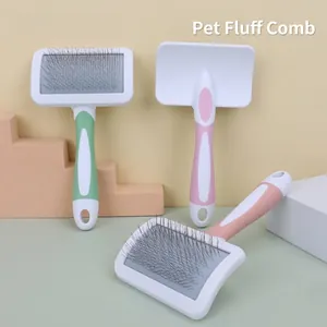 Ergonomic pet grooming needle brush set in green and pink for shedding and detangling