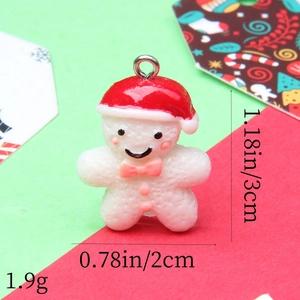 Detailed view of resin Christmas pendant with dimensions 3x2cm and weight 1.9g