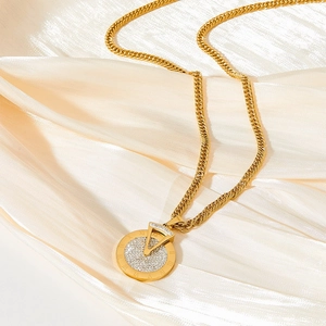 Long stainless steel gold necklace with rotating Roman numeral crystal pendant on silk