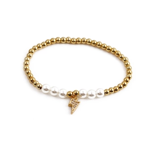 Elegant gold bead and pearl bracelet featuring a micro-paved zircon lightning bolt pendant